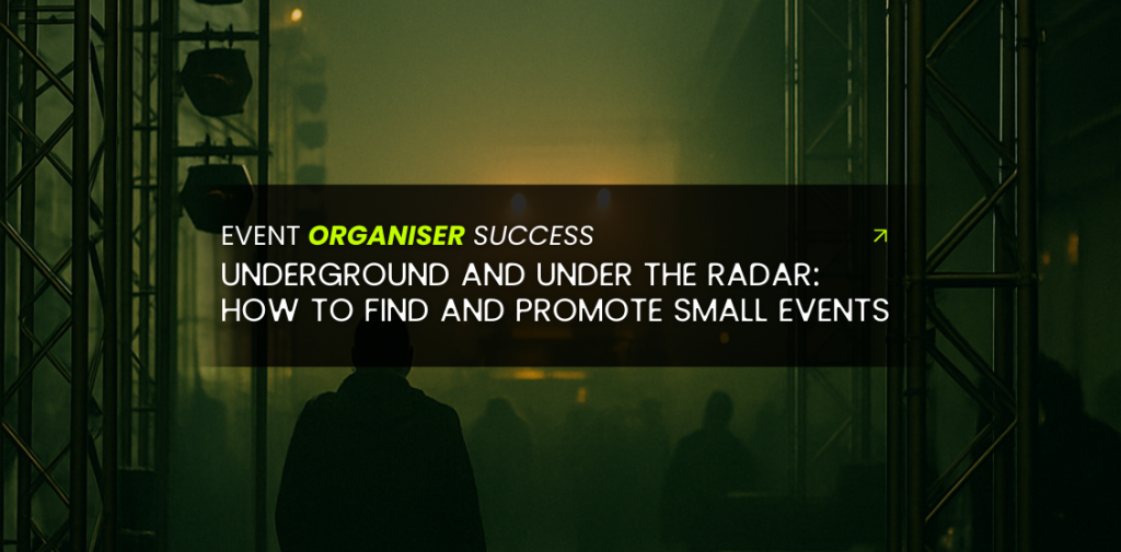 Silhouette of a person standing in a green fog-lit underground venue with truss structures and event lighting.